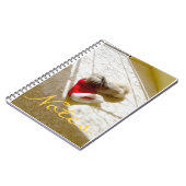 捕獲されたサンタ ノートブック (左側)