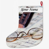 接眼レンズそしてゴム印が付いている元帳 ラージクリスマスストッキング (裏面)