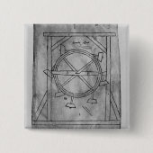 推定上永久運動の木槌および車輪 缶バッジ (正面)