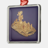 描写するMuiscaの奉納の置物 メタルオーナメント (左)