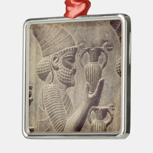 提供する2つ詳細のレリーフ、浮き彫りを運んでいるPhoenician メタルオーナメント (左)