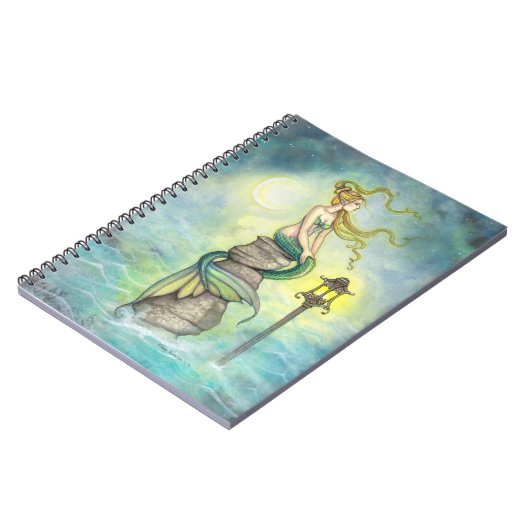 提灯と月のファンタジーアートを持つ神秘的な人魚 ノートブック (左側)