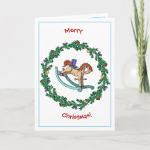 揺り木馬が付いているクリスマスのリース