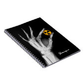 放射線シンボルを持つ手 ノートブック (右側)