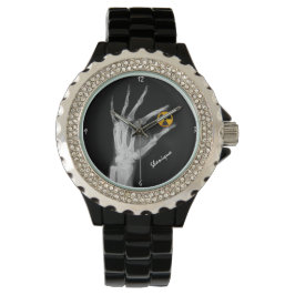 放射線シンボルを持つ手 腕時計