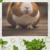 救出の準備:火の虫の帽子をかぶったモルモット。 キッチンタオル (折り畳み)