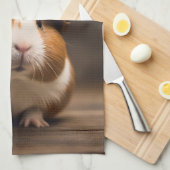 救出の準備:火の虫の帽子をかぶったモルモット。 キッチンタオル (四つ折り)