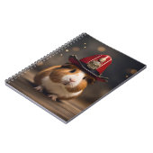 救出の準備：火の虫の帽子をかぶったモルモット。 ノートブック (左側)