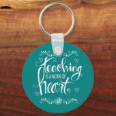 教えはハートだ |かわいいフレーズ キーホルダー (正面)