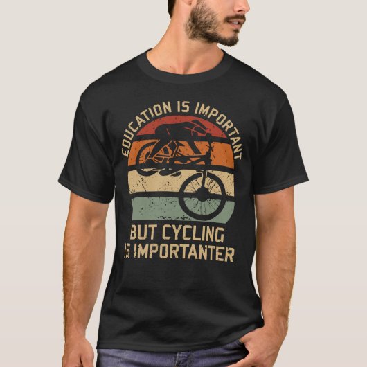 教育は重要だがサイクリングは重要 Tシャツ (正面)
