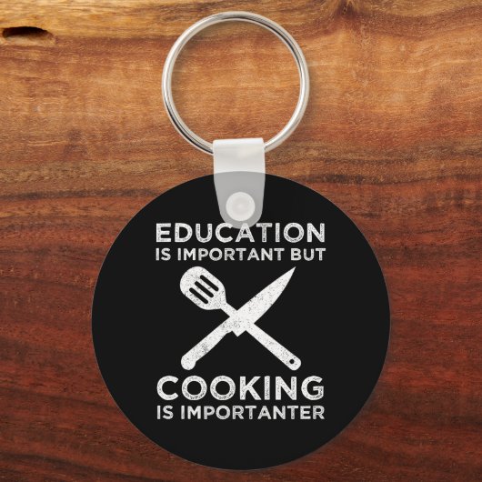 教育は重要だが料理は重要だ キーホルダー (正面)