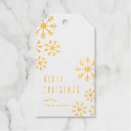 散在する雪フォイルのクリスマスと休日のギフトタグ ギフトタグ