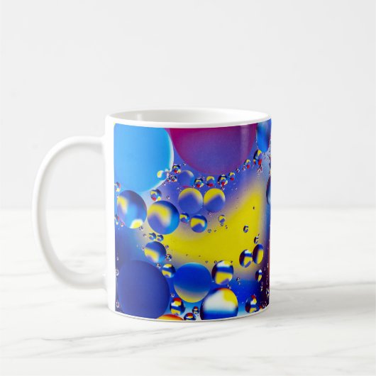 数々の色の泡 コーヒーマグカップ (左)