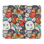 数々の色ドードルモンスター顔 カッティングボード (正面)