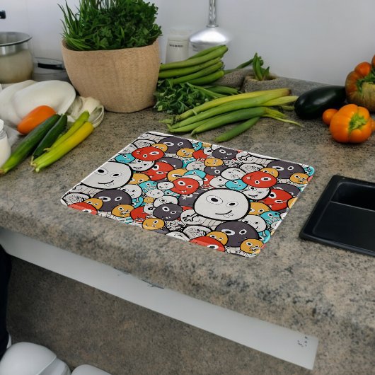 数々の色ドードルモンスター顔 カッティングボード