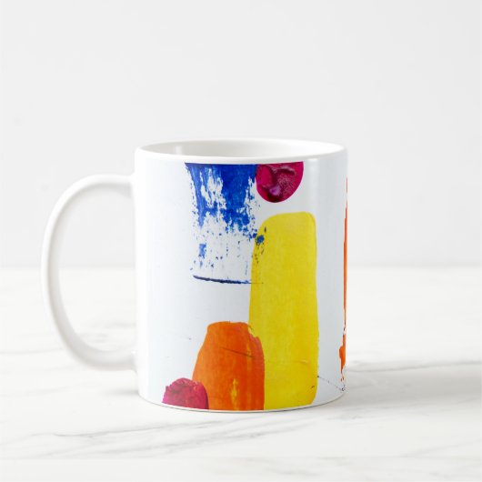 数々の色絵画の コーヒーマグカップ (左)
