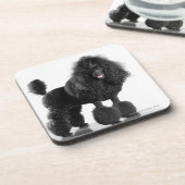 整えられた黒いプードル コースター (左側)