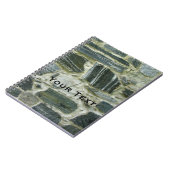 文字が付いている古い石塀 ノートブック (左側)