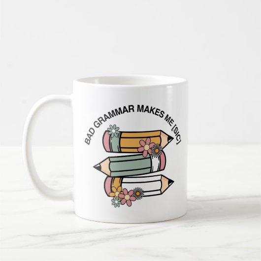 文法が下手だと気が済む | 英おもしろい語先生 コーヒーマグカップ (左)