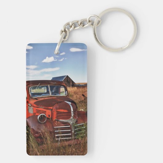 断念された農場が付いている錆つくオレンジごまかしのトラック キーホルダー (裏面)