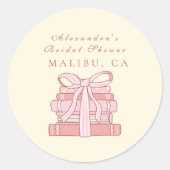 新しい章がピンクの本を始め、弓を引く ラウンドシール (正面)