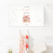 新しい章が始まる ピンクの蝶結びの本 赤ちゃんのお披露目 横断幕 (インサイチュ)