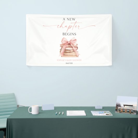 新しい章が始まる ピンクの蝶結びの本 赤ちゃんのお披露目 横断幕 (トレードショー)