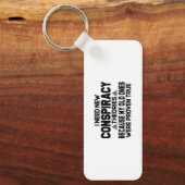 新しい陰謀説キーチェーンが必要だ キーホルダー (正面)