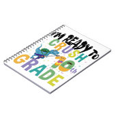 新学期10年生のディノをつぶす準備ができている ノートブック (左側)