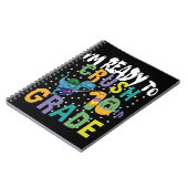 新学期10年生のディノをつぶす準備ができている ノートブック (左側)