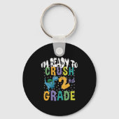 新学期2年生のディノをつぶす準備ができている キーホルダー (正面)