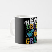 新学期6年生のディノをつぶす準備ができている コーヒーマグカップ (正面左)