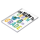 新学期8年生のディノをつぶす準備ができている ノートブック (左側)