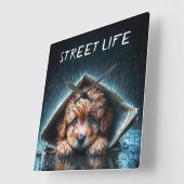 新聞の避難所の下で愛らしい濡れたワンちゃん スクエア壁時計 (傾斜)