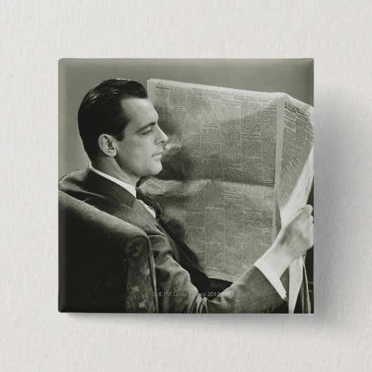 新聞を読んでいるビジネスマン 缶バッジ (正面)