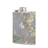 新聞用紙の背景に白い花 フラスク (左)