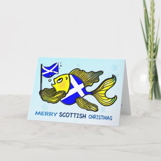 旗カードを握っているメリーなスコットランドのクリスマスの魚 シーズンカード (正面)