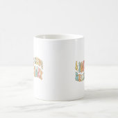 日々の現実保の本遠くに コーヒーマグカップ (中央)