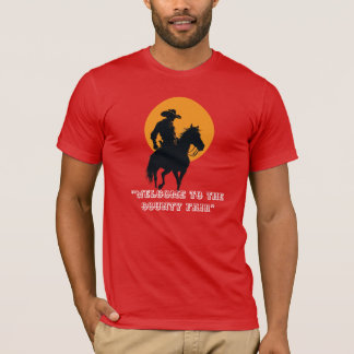日の入りへの騎乗 –カウボーイのシルエットTシャツ Tシャツ