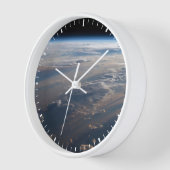 日の出がフィリピン海に長い影を落とす 壁時計 (傾斜)