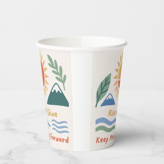 日の出のイラストレーション"ライズとシャイン！"引用文モット 紙コップ (左)