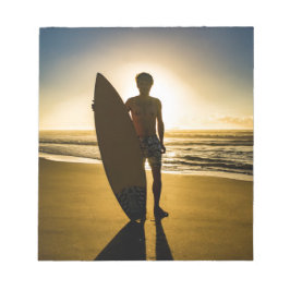 日の出時のサーファーのシルエット ノートパッド