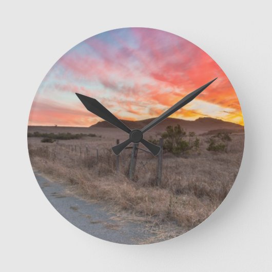 日の最初日没 ラウンド壁時計 (正面)