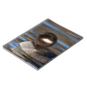 日の照った海にかわいいバッファヘッドアヒル ノートブック (左側)