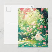 日当たりの良い桜の果樹園の白いうさぎ ポストカード (正面/裏面)
