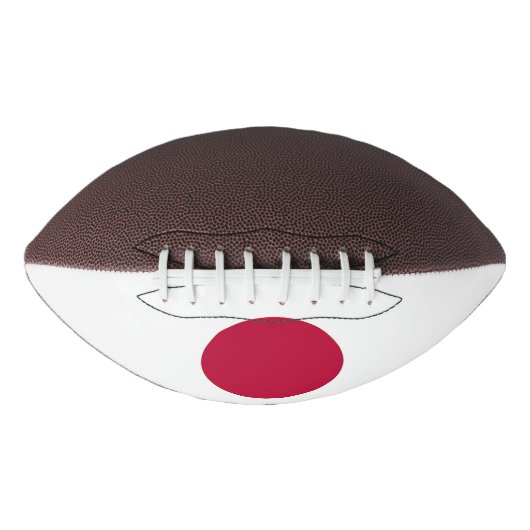 日本国旗を掲げた愛国的なアメリカンフットボール アメリカンフットボール (正面)