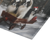 日本狆の雪景色のソリ クリスマスの飾り カッティングボード (角)