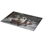 日本狆の雪景色のソリ クリスマスの飾り カッティングボード (角)