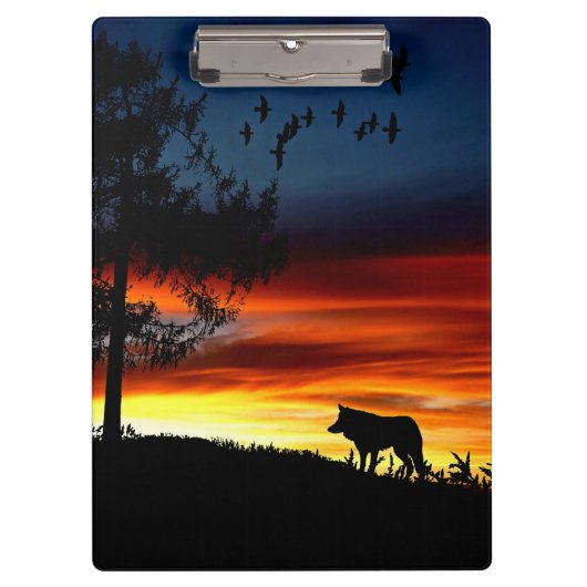 日没のオオカミと鳥と木の黒いシルエット クリップボード (正面)