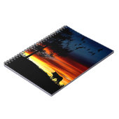 日没のオオカミと鳥と木の黒いシルエット ノートブック (左側)